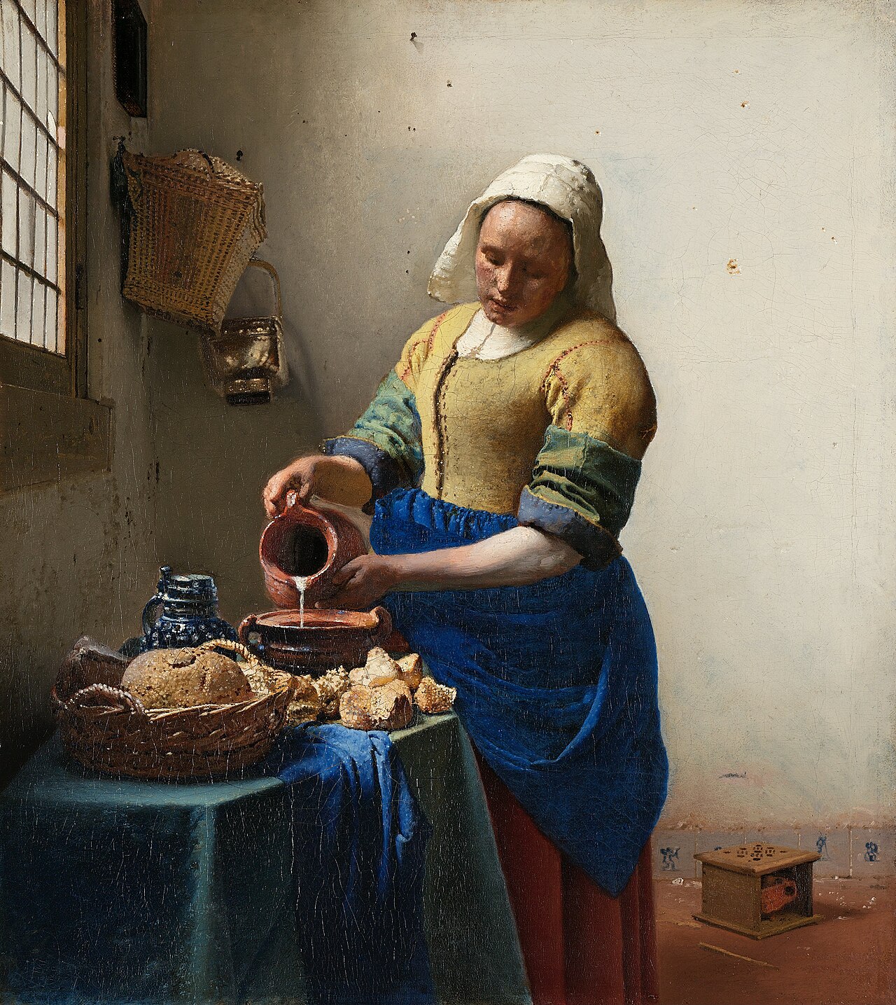 フェルメール『牛乳を注ぐ女』1658-1660年頃、アムステルダム国立美術館蔵