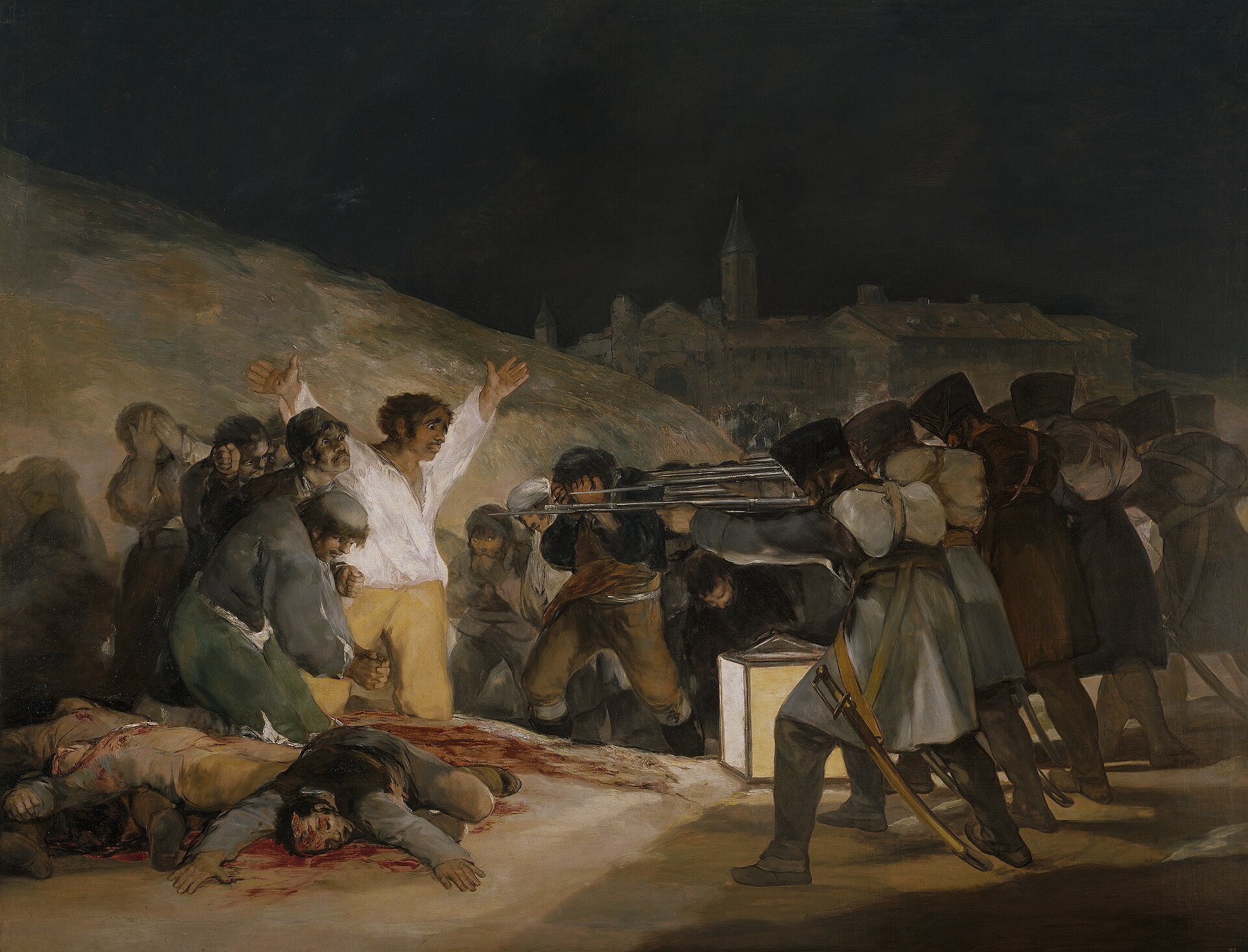 フランシスコ・デ・ゴヤ『マドリード、1808年5月3日』1814年、プラド美術館蔵。ランタンの光が、銃殺される男の白いシャツを照らす